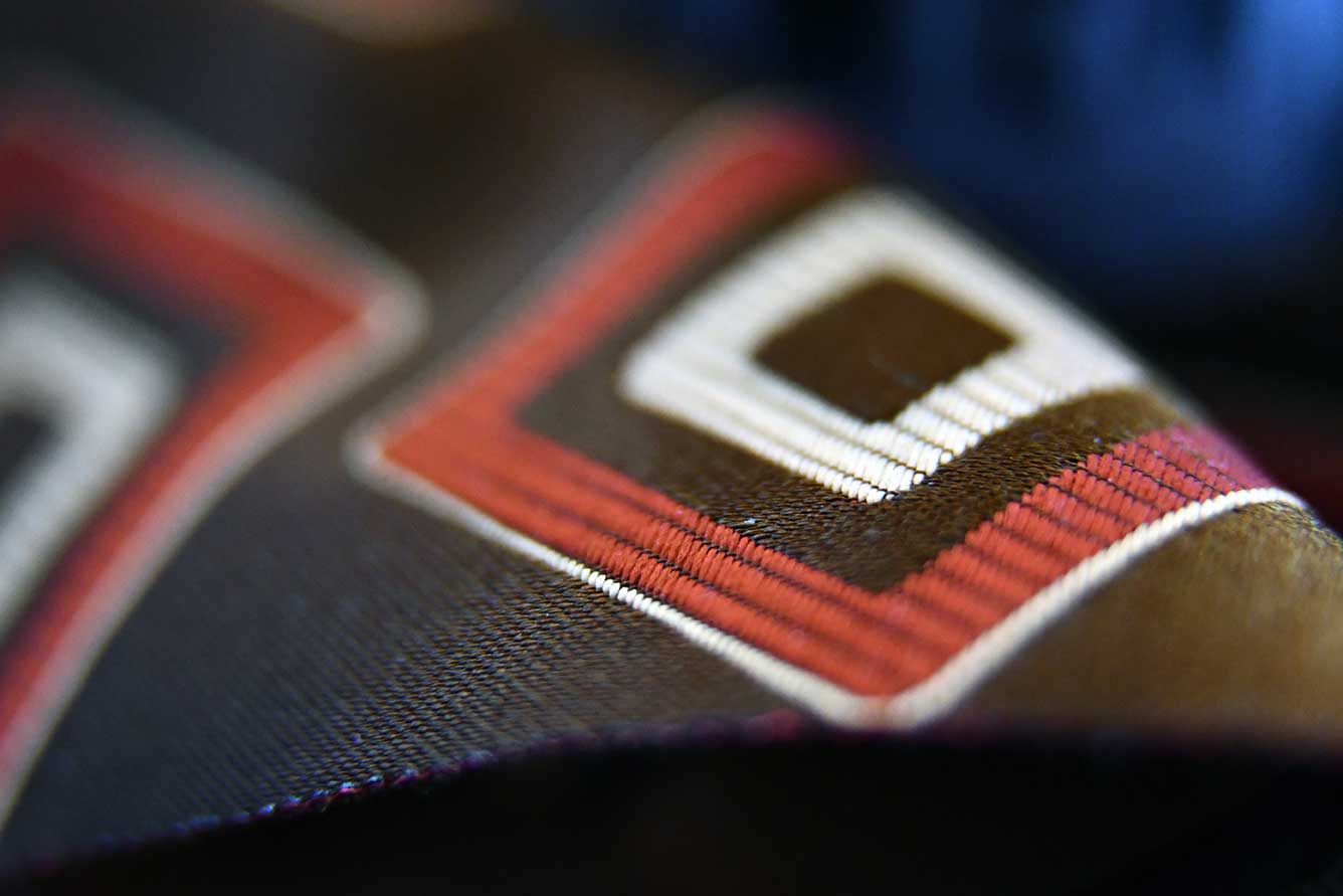 Makro fotografija proizvoda na kojoj se može vidjeti struktura tkanja tkanine